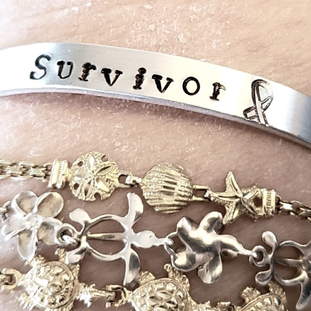 Survivor, Aluminum cuff br…